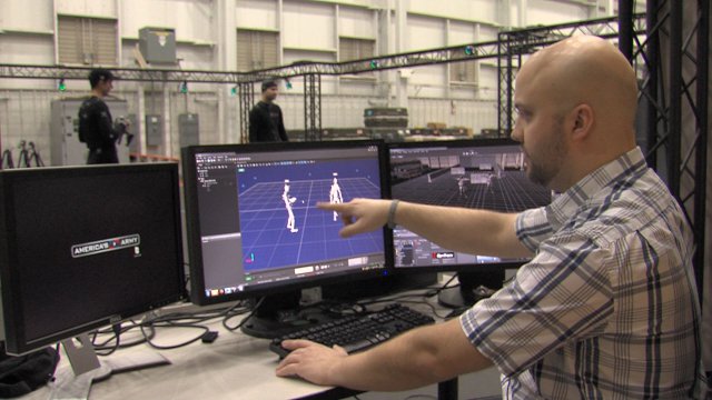 Former-U.S.-Army-Soldiers-Matt-Roberts-and-Ben-Day-along-with-Lead-Animator-Steve-Ross-are-suited-up-at-the-Army-Game-Studio